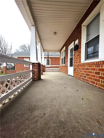 a view of an empty room with a garage