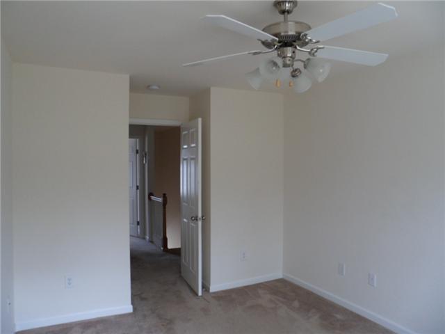 4022 Clinton Lane Spring Hill, TN 37174 - Photo 11 of 16 a view of a chandelier fan in a room