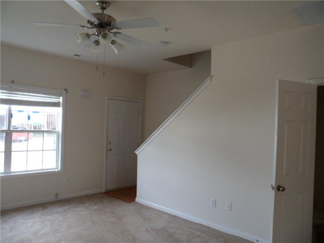 4022 Clinton Lane Spring Hill, TN 37174 - Photo 4 of 16 a view of room with a ceiling fan and window