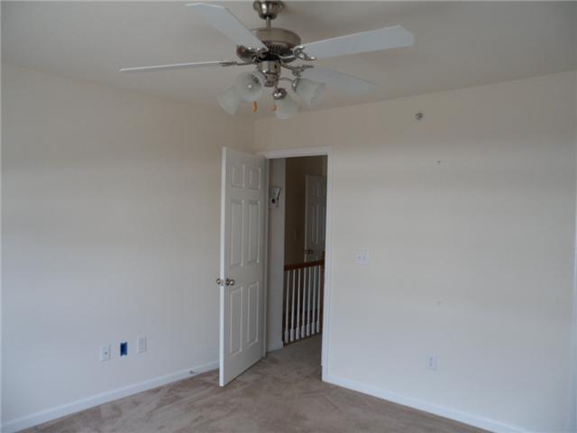 4022 Clinton Lane Spring Hill, TN 37174 - Photo 8 of 16 a view of a chandelier fan in a room