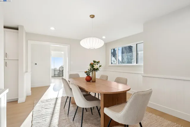 a bedroom with a large bed and a couch