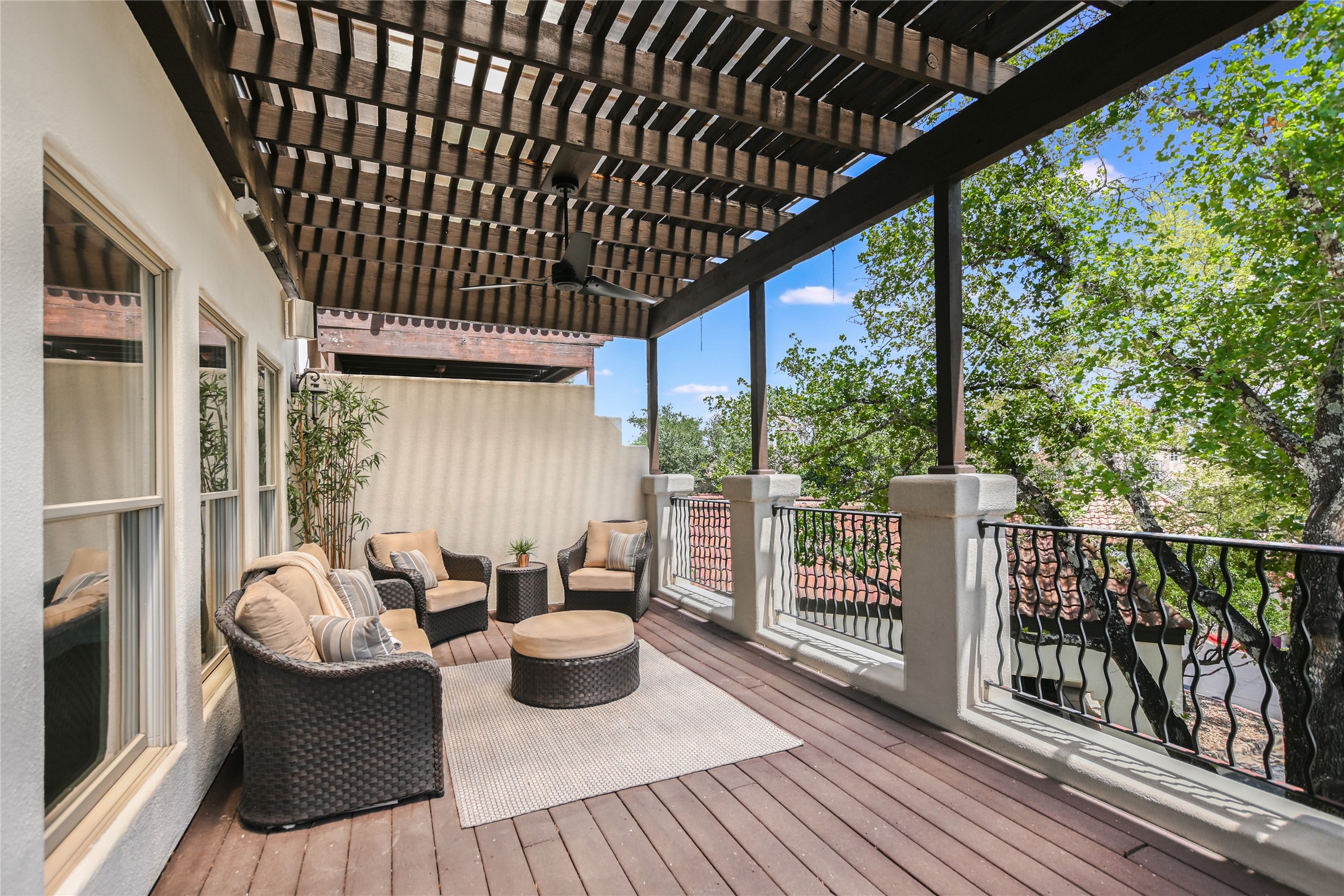1910 Rue De St Tropez, Unit 4 Austin, TX 78746 - Photo 16 of 36 Deck with outdoor furniture, a ceiling fan, and a pergola