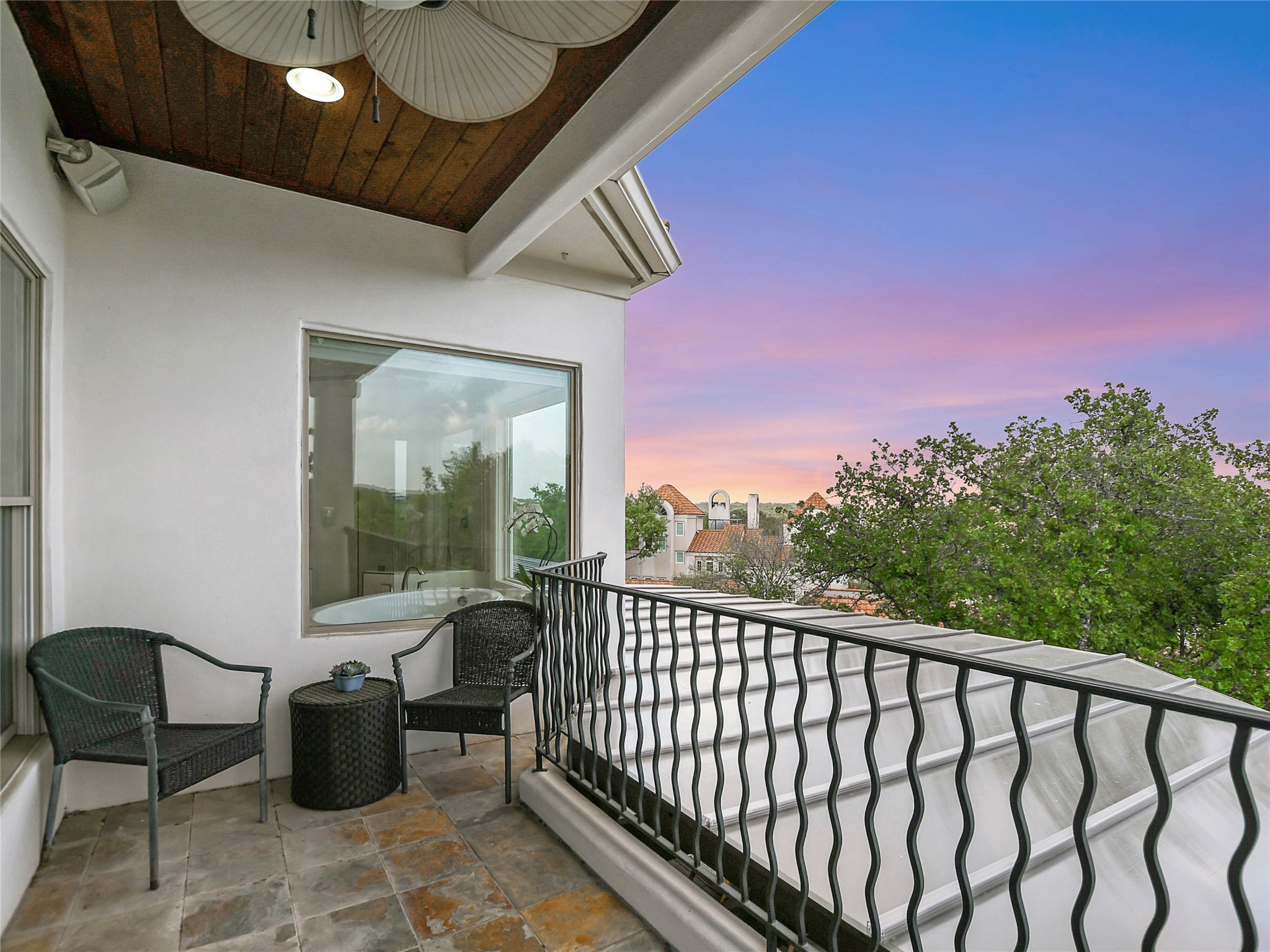 1910 Rue De St Tropez, Unit 4 Austin, TX 78746 - Photo 9 of 36 Balcony featuring ceiling fan