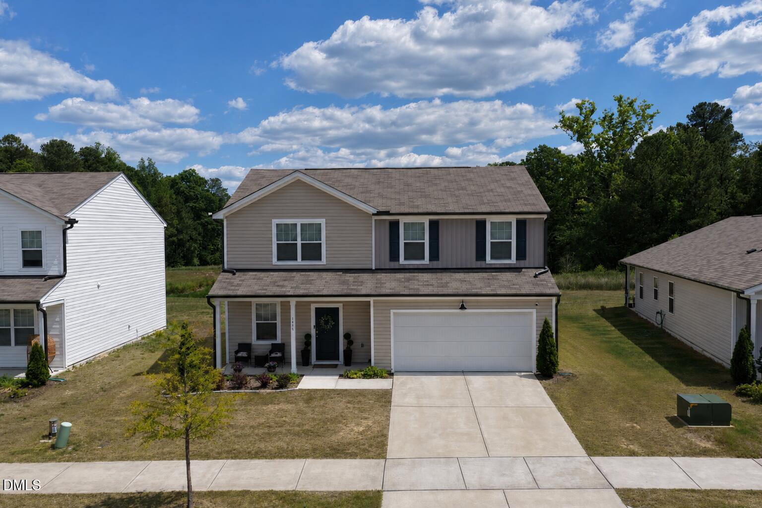 1416 Heron Pond Street Raleigh, NC 27604 - Photo 1 of 25 a front view of a house with entertaining space