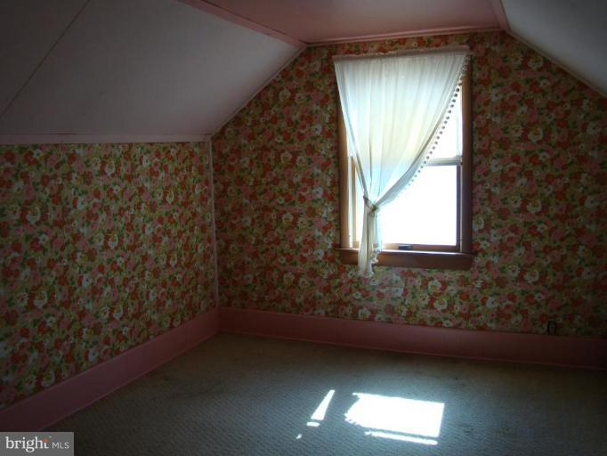 4113 Cliffvale Road Nottingham, MD 21236 - Photo 6 of 8 an empty room with a window