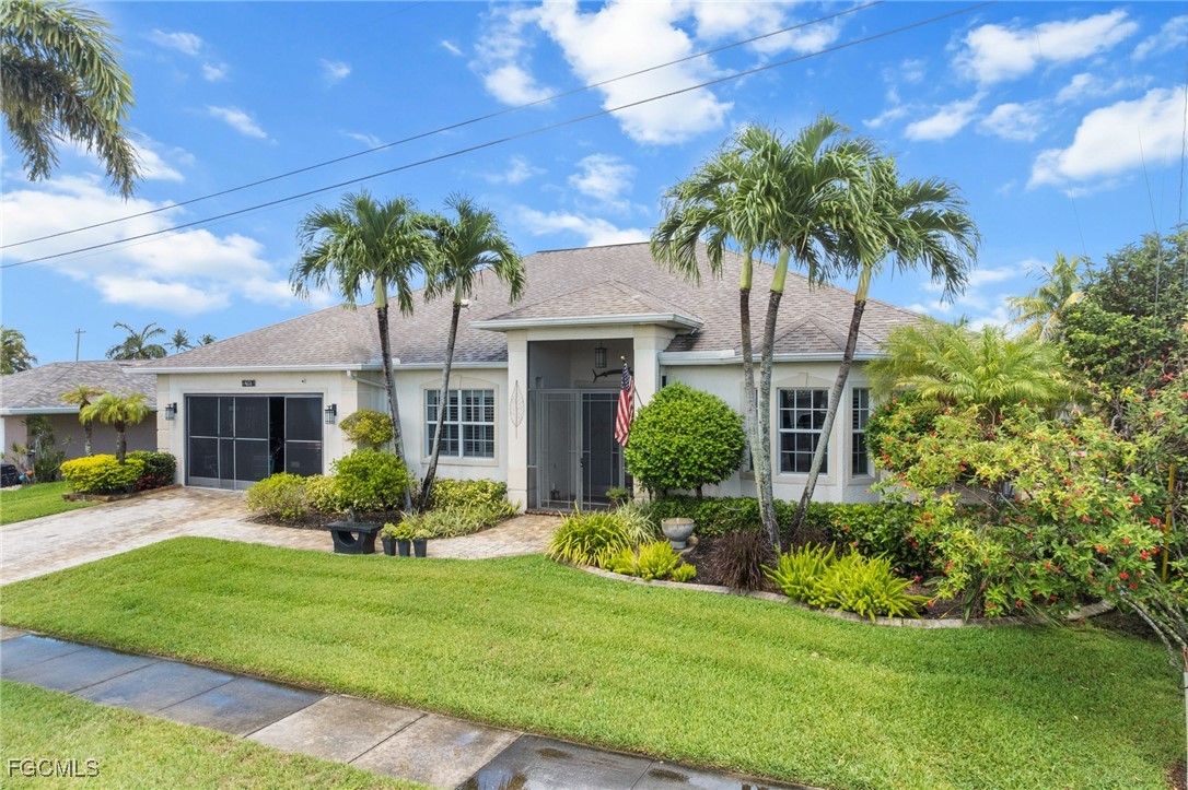 4424 North Bay Circle North Fort Myers, FL 33903 - Photo 1 of 43 a front view of house with yard and green space