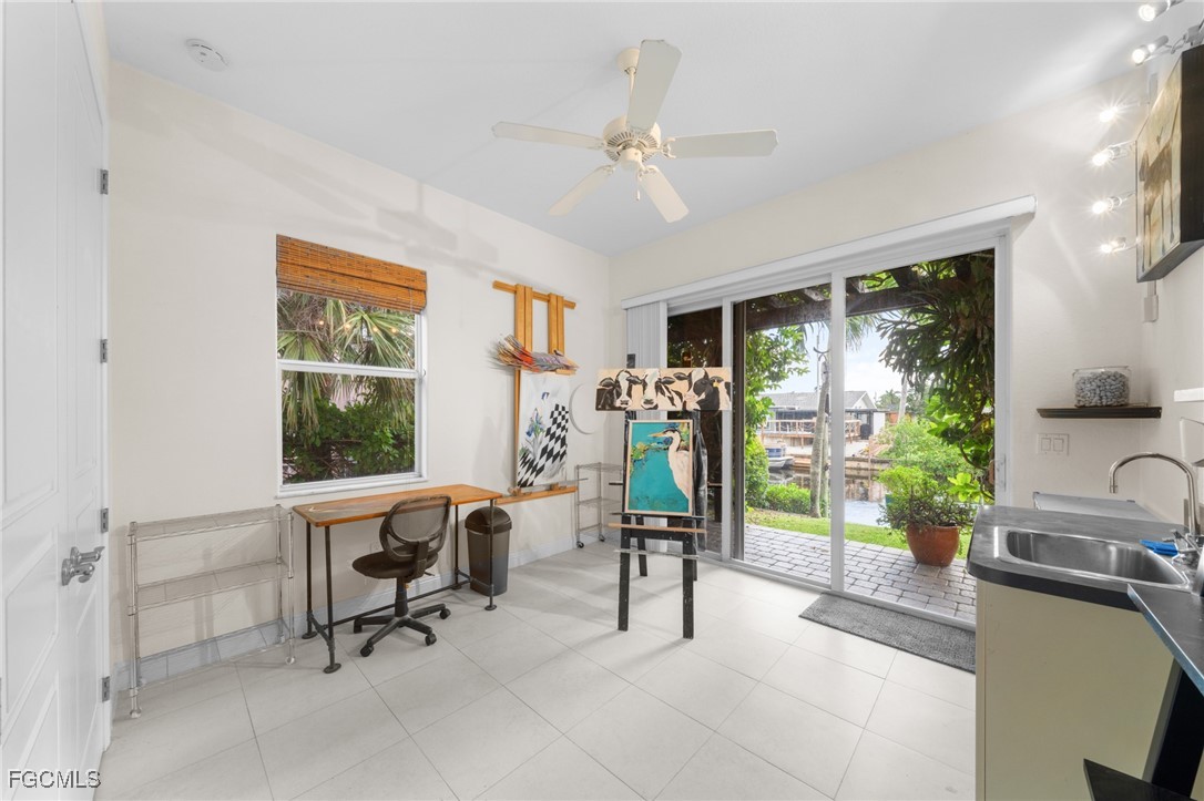 4424 North Bay Circle North Fort Myers, FL 33903 - Photo 25 of 43 a view of a livingroom with workspace and a window
