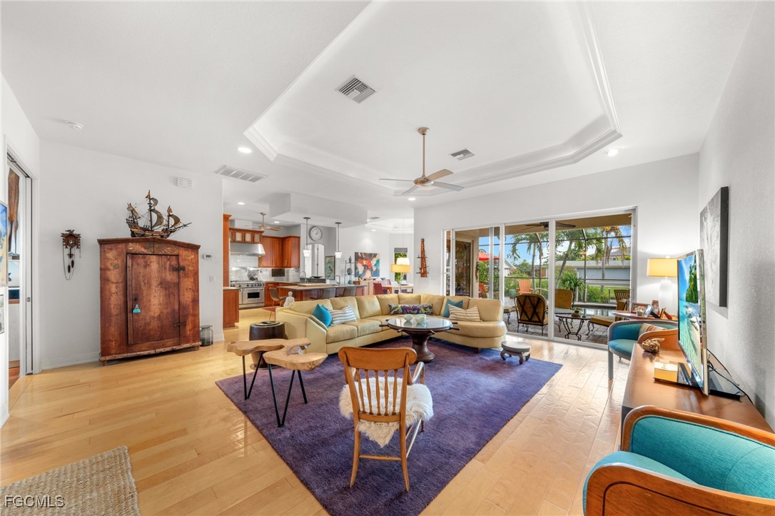 4424 North Bay Circle North Fort Myers, FL 33903 - Photo 4 of 43 a living room with furniture and a large window