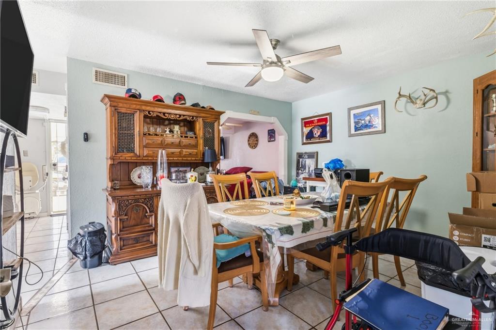 2124 Hawk Avenue McAllen, TX 78504 - Photo 15 of 18 a view of a dining room with furniture