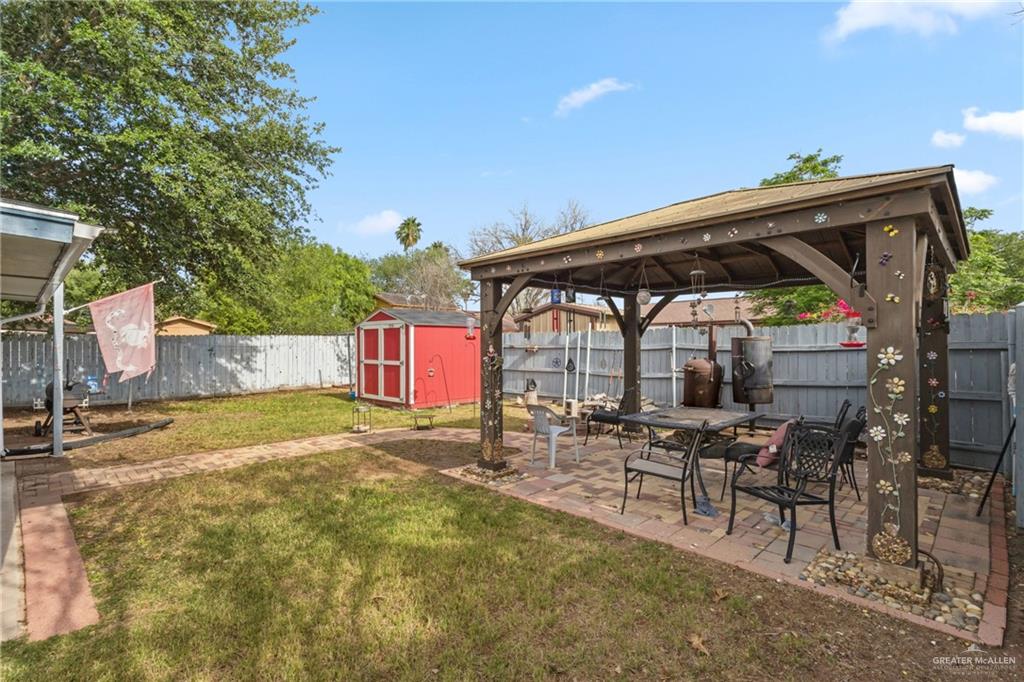 2124 Hawk Avenue McAllen, TX 78504 - Photo 16 of 18 a view of patio with chairs and tables