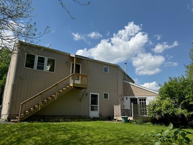 5044 Butler Road Canandaigua Town, NY 14424 - Photo 45 of 45 Back of home with deck and new stairway to apartme