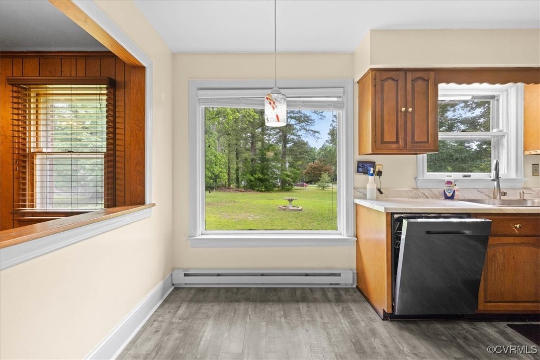 448 Jasper Lane Waverly, VA 23890 - Photo 17 of 44 a view of a kitchen with wooden floor and a window