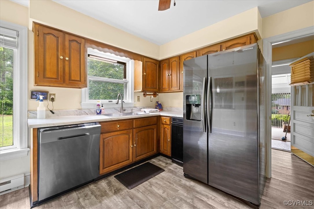 448 Jasper Lane Waverly, VA 23890 - Photo 18 of 44 a kitchen with stainless steel appliances granite countertop a refrigerator and a sink