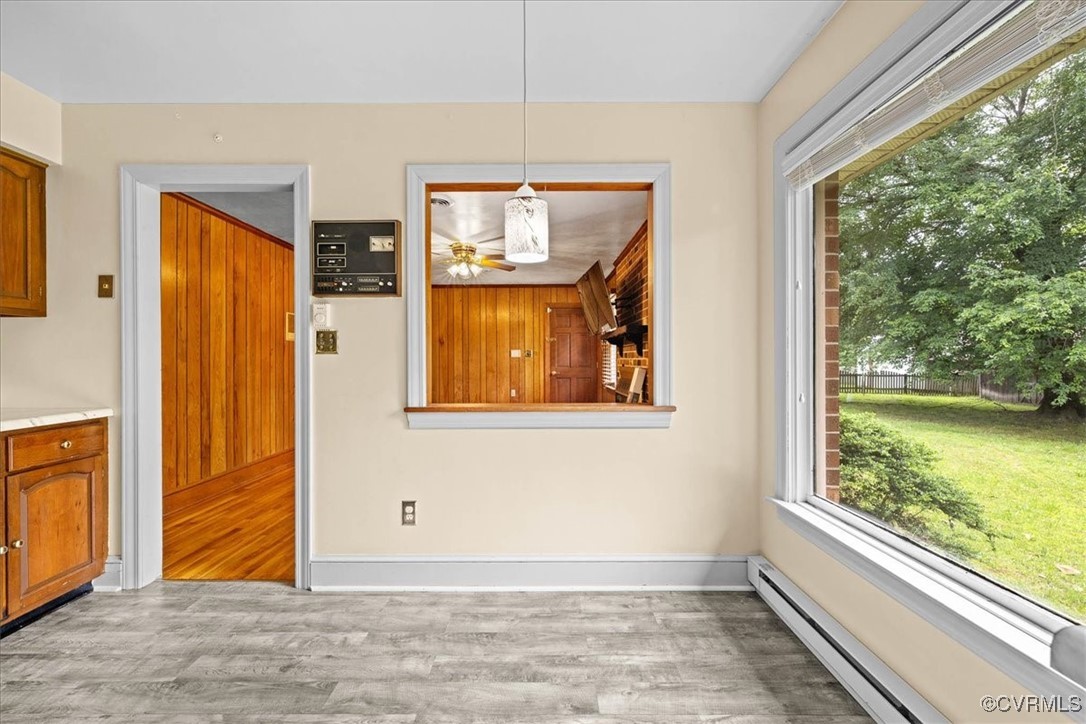 448 Jasper Lane Waverly, VA 23890 - Photo 19 of 44 a view of a livingroom with wooden floor and windows