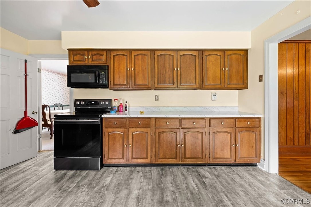 448 Jasper Lane Waverly, VA 23890 - Photo 20 of 44 a kitchen with stainless steel appliances granite countertop a refrigerator and a stove top oven