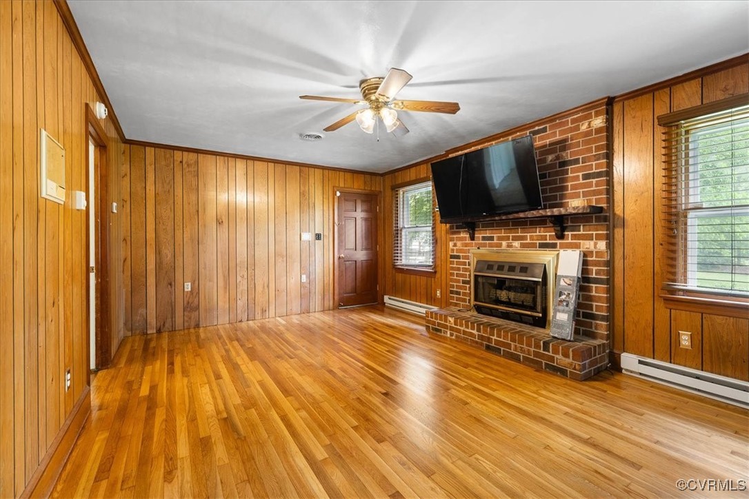448 Jasper Lane Waverly, VA 23890 - Photo 21 of 44 a view of livingroom with kitchen microwave and furniture