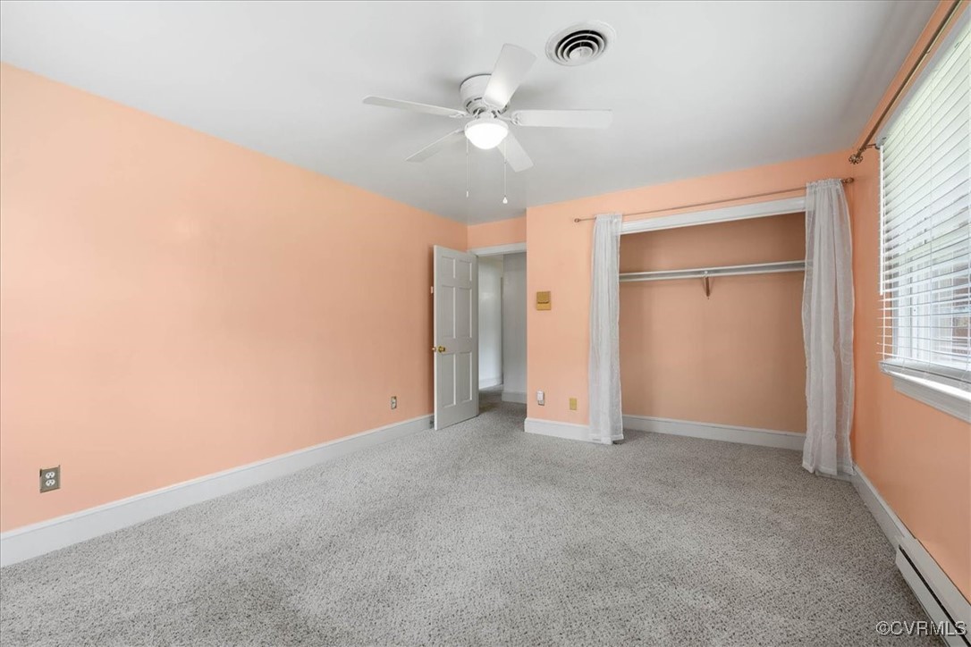 448 Jasper Lane Waverly, VA 23890 - Photo 26 of 44 an empty room with closet and windows