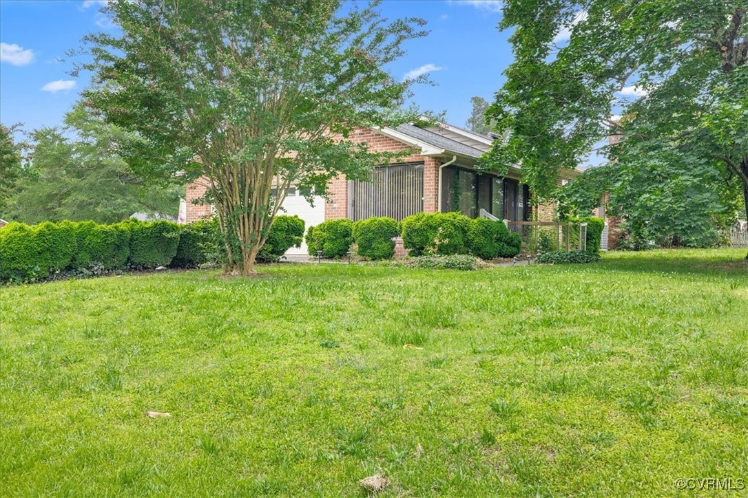 448 Jasper Lane Waverly, VA 23890 - Photo 32 of 44 a view of a house with yard and green space
