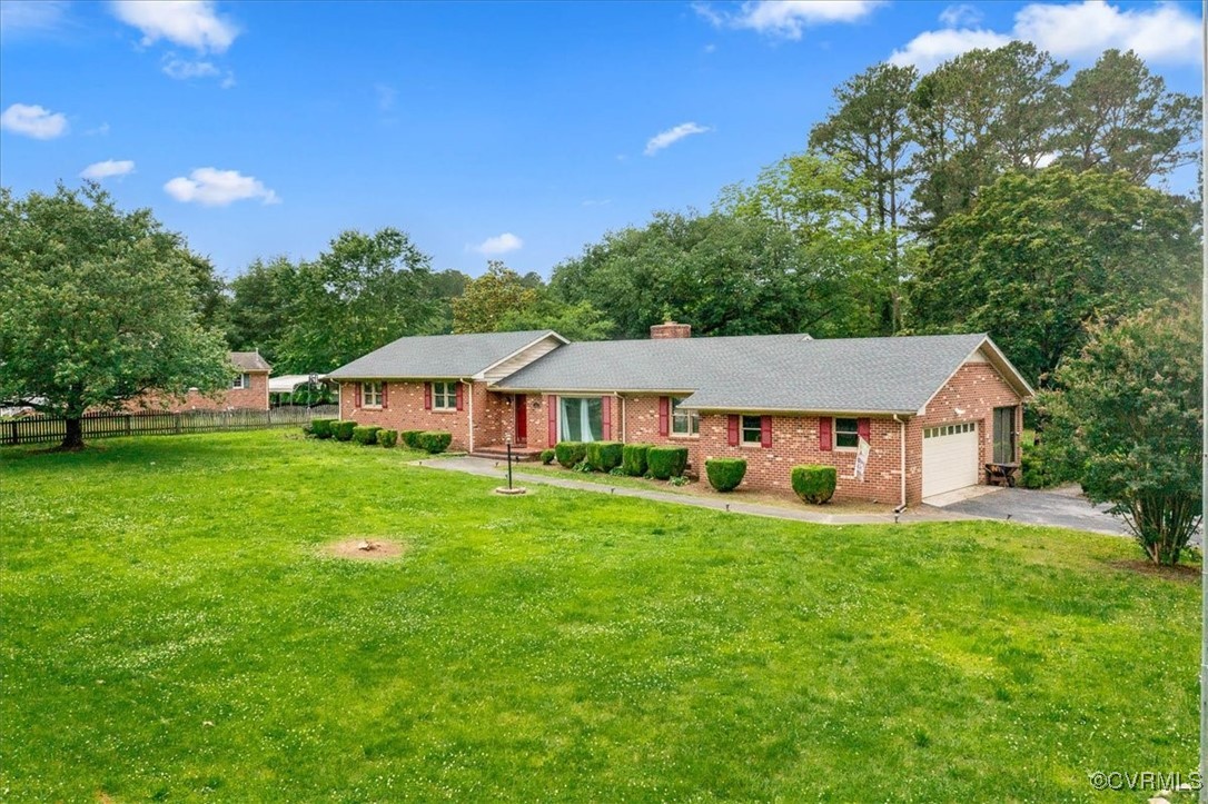 448 Jasper Lane Waverly, VA 23890 - Photo 35 of 44 a view of a house with a big yard