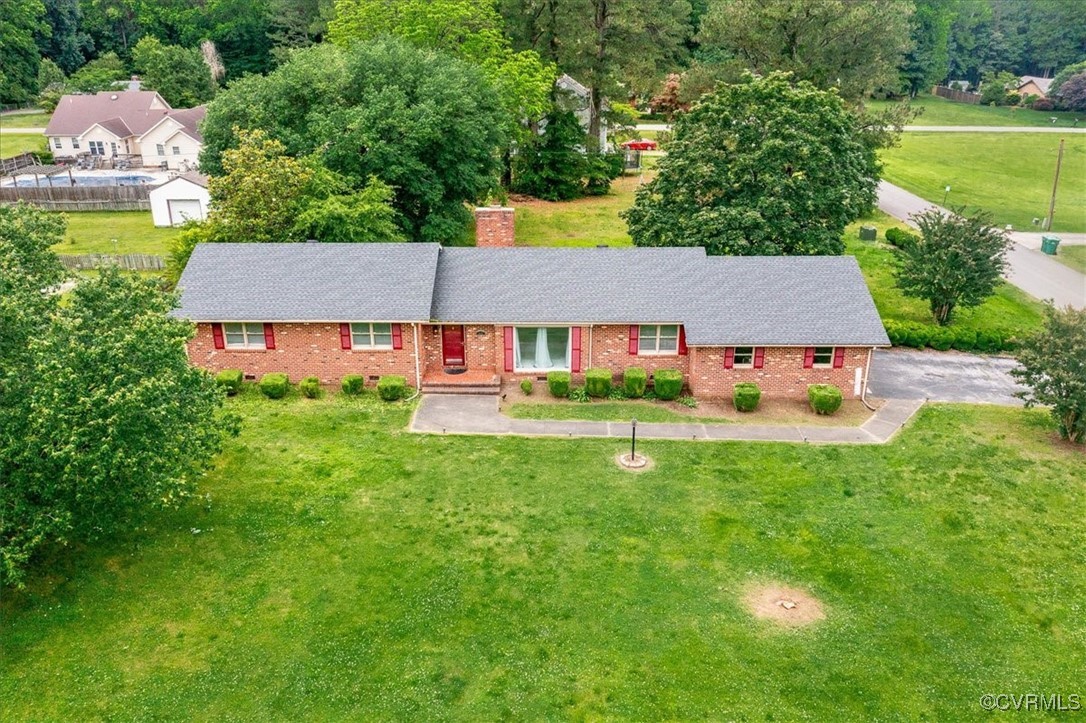 448 Jasper Lane Waverly, VA 23890 - Photo 37 of 44 an aerial view of house with swimming pool outdoor seating and yard