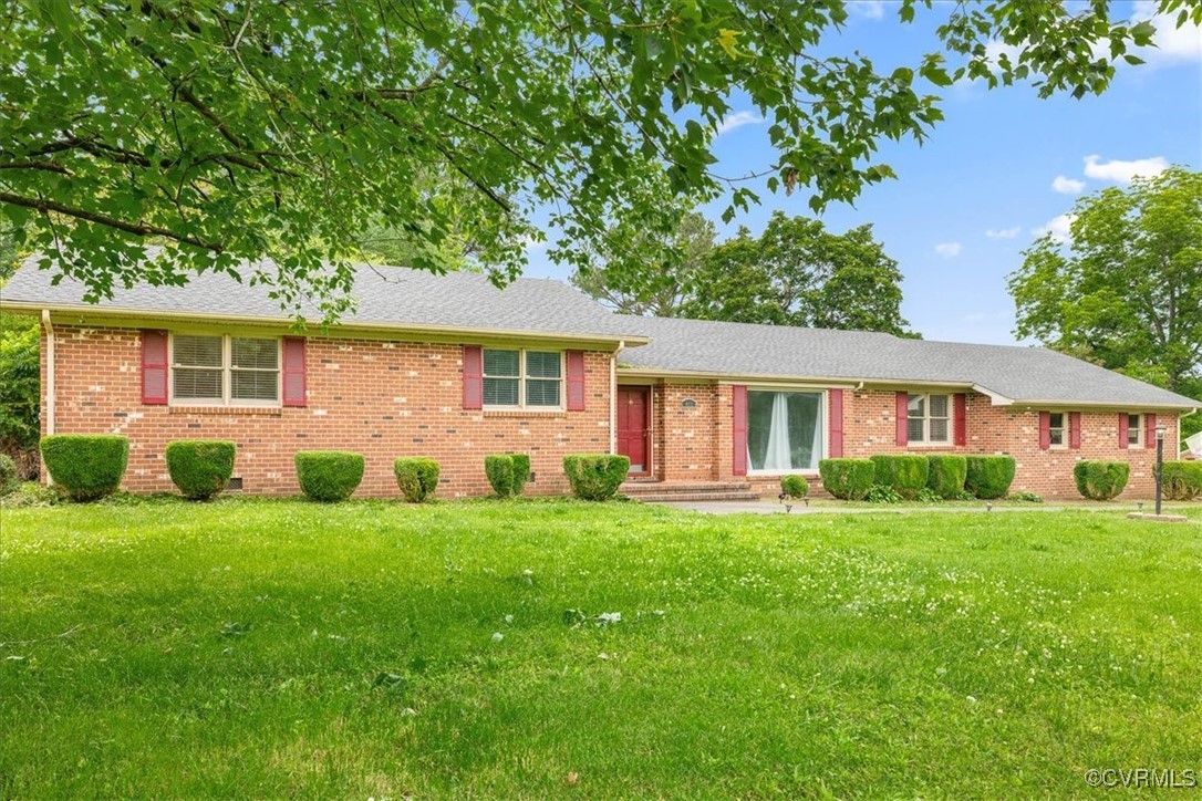 448 Jasper Lane Waverly, VA 23890 - Photo 4 of 44 a view of a house with a yard