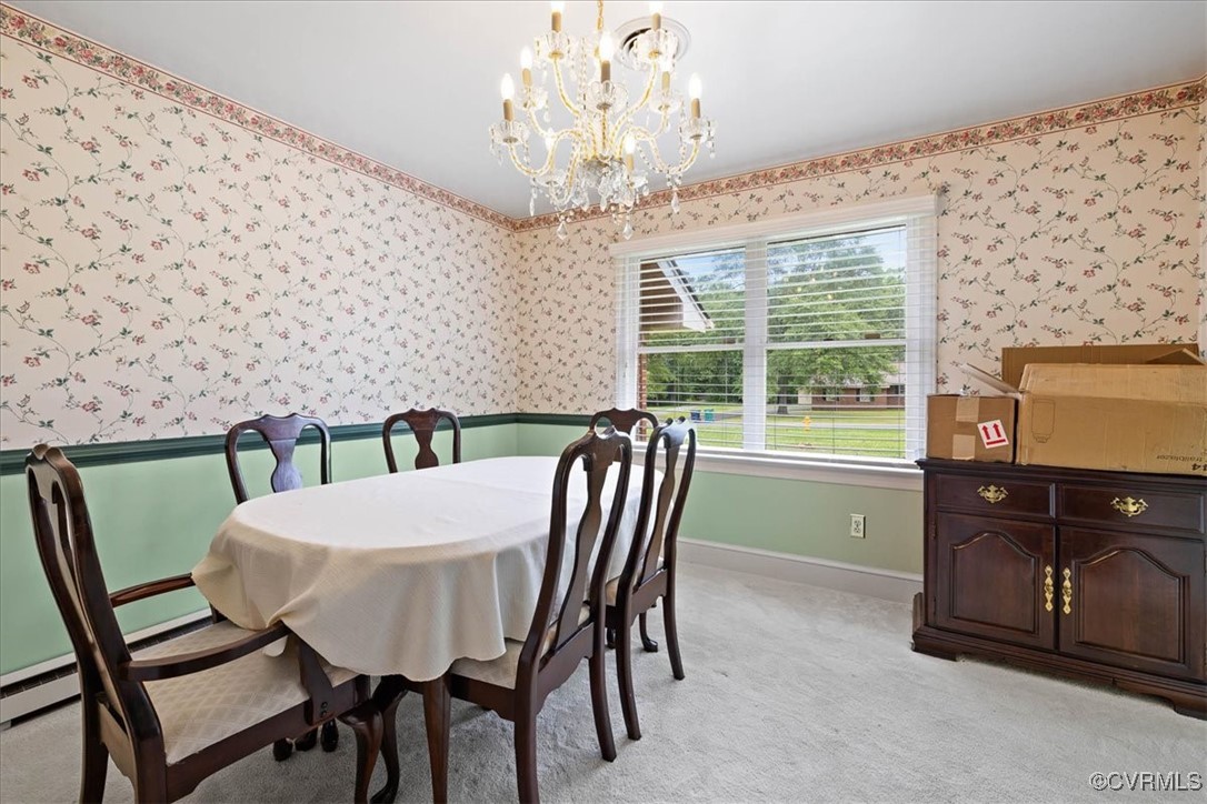 448 Jasper Lane Waverly, VA 23890 - Photo 9 of 44 a view of a dining room with furniture and chandelier