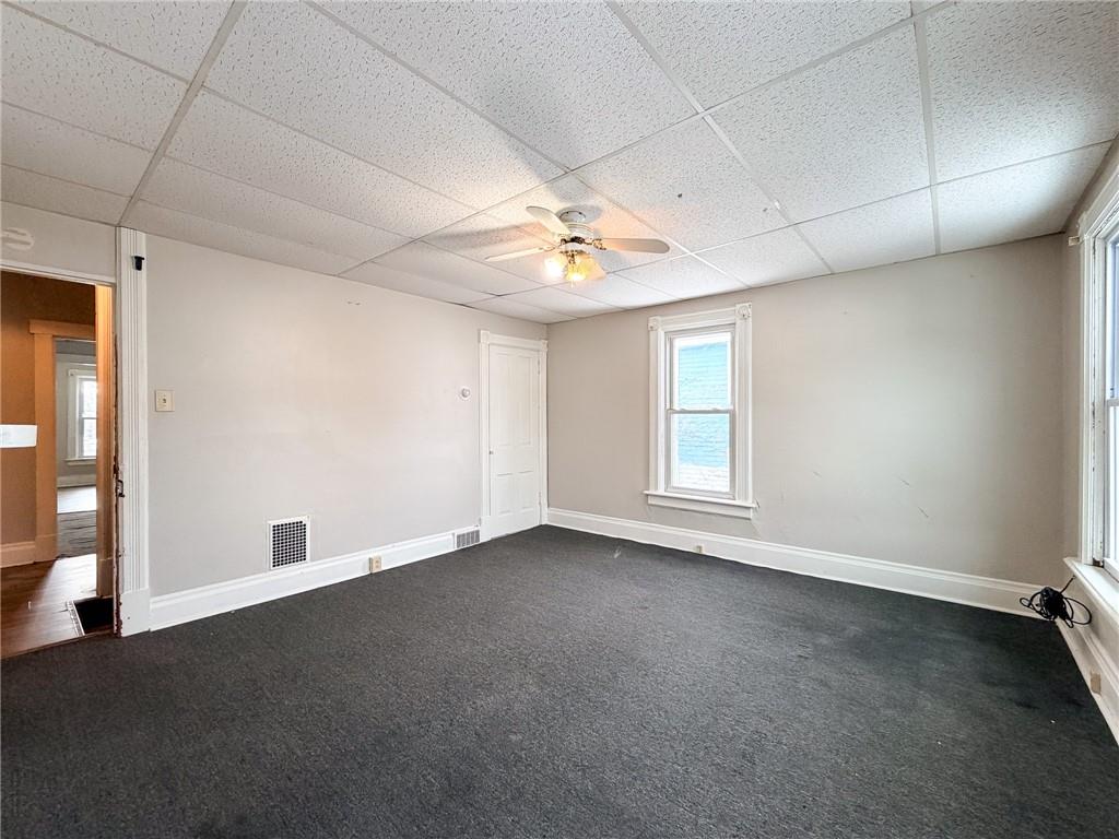 219 13th Street, Unit 2 Beaver Falls, PA 15010 - Photo 4 of 12 a view of an empty room with a window