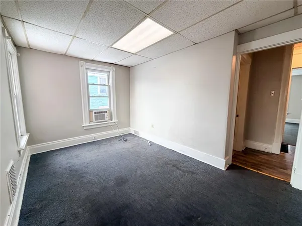 an empty room with windows