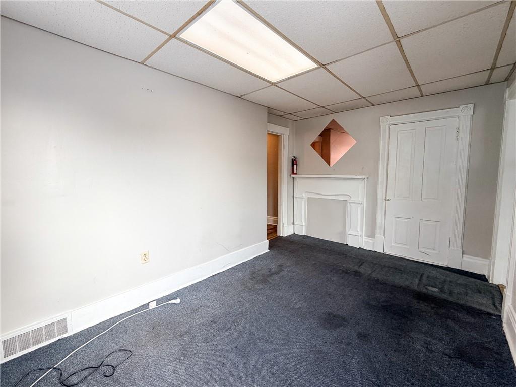 219 13th Street, Unit 2 Beaver Falls, PA 15010 - Photo 8 of 12 a view of an empty room with a window