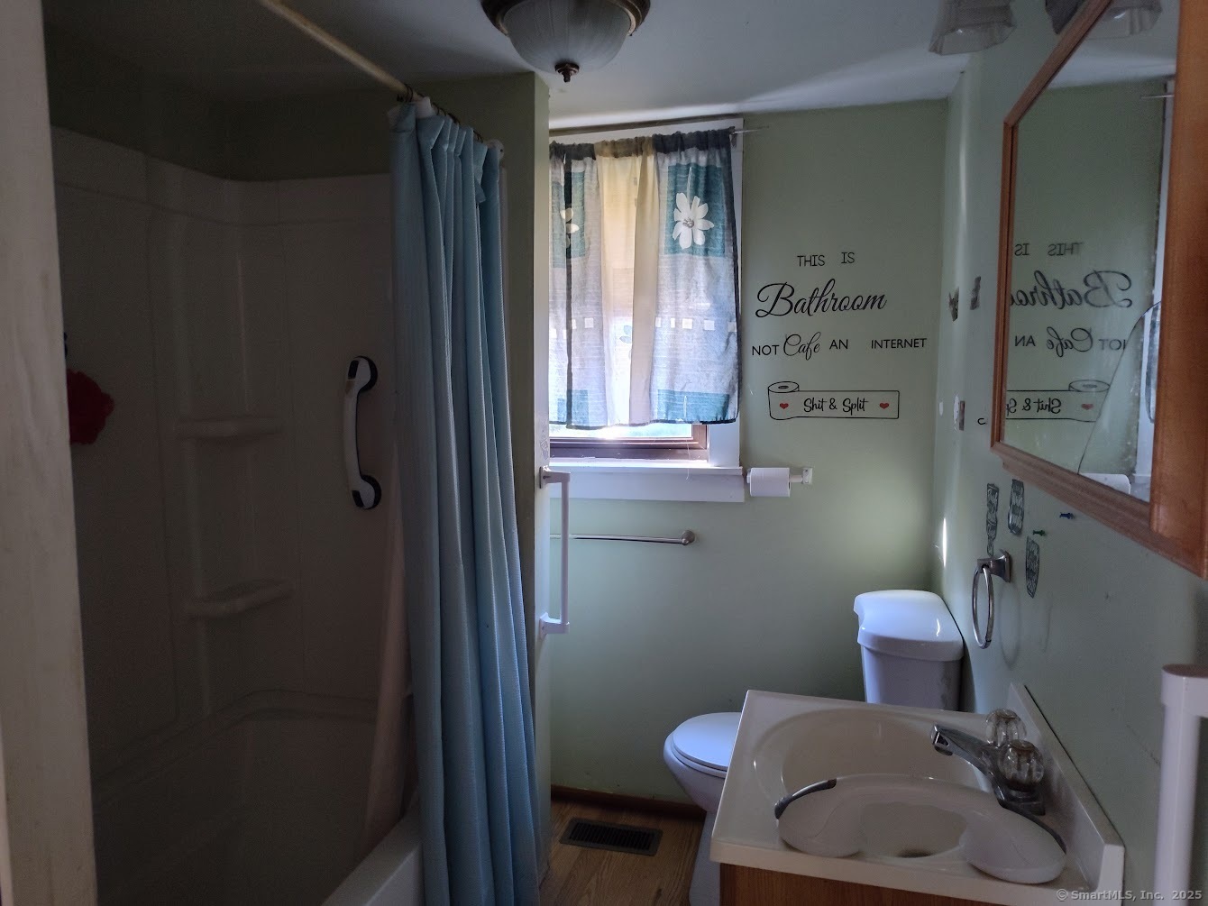155 Iron Street Ledyard, CT 06339 - Photo 11 of 17 a bathroom with a toilet a sink and shower