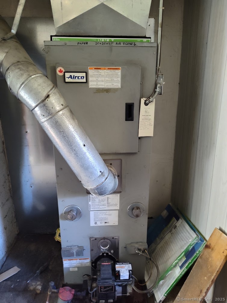 155 Iron Street Ledyard, CT 06339 - Photo 16 of 17 a view of living room with furniture and a window