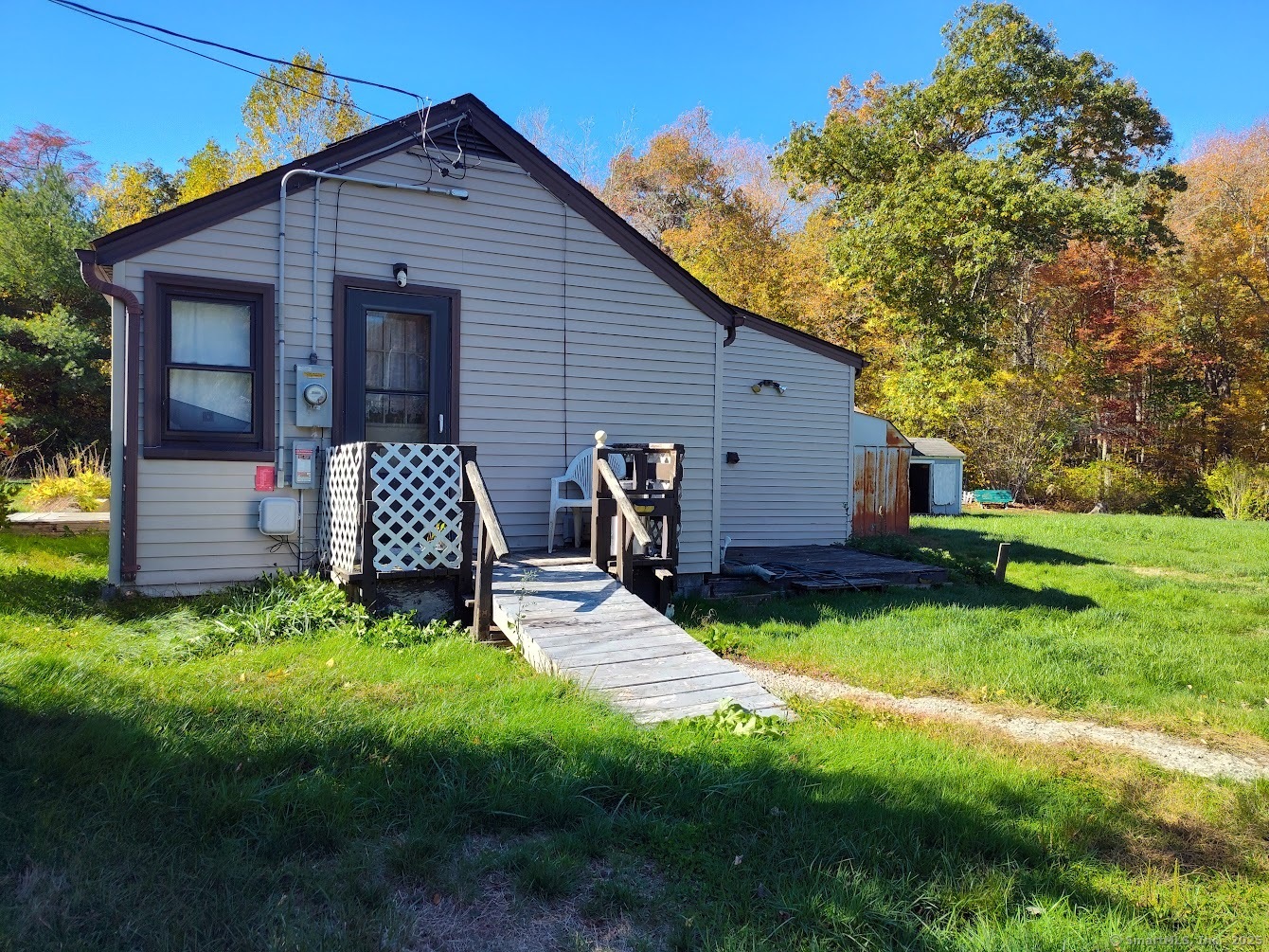 155 Iron Street Ledyard, CT 06339 - Photo 2 of 17 a view of backyard with a garden and entertaining space