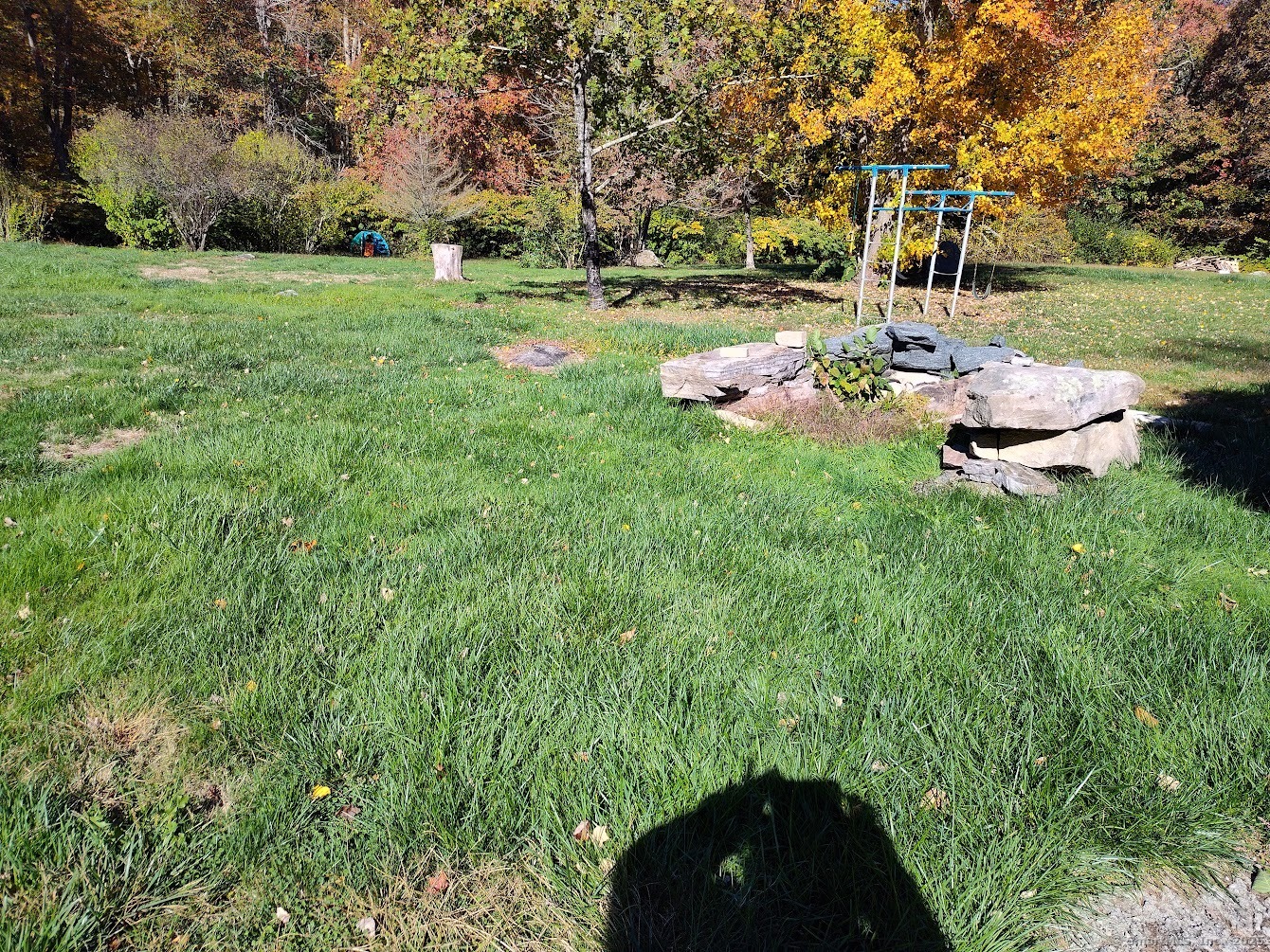 155 Iron Street Ledyard, CT 06339 - Photo 5 of 17 a backyard of a house with yard and outdoor seating