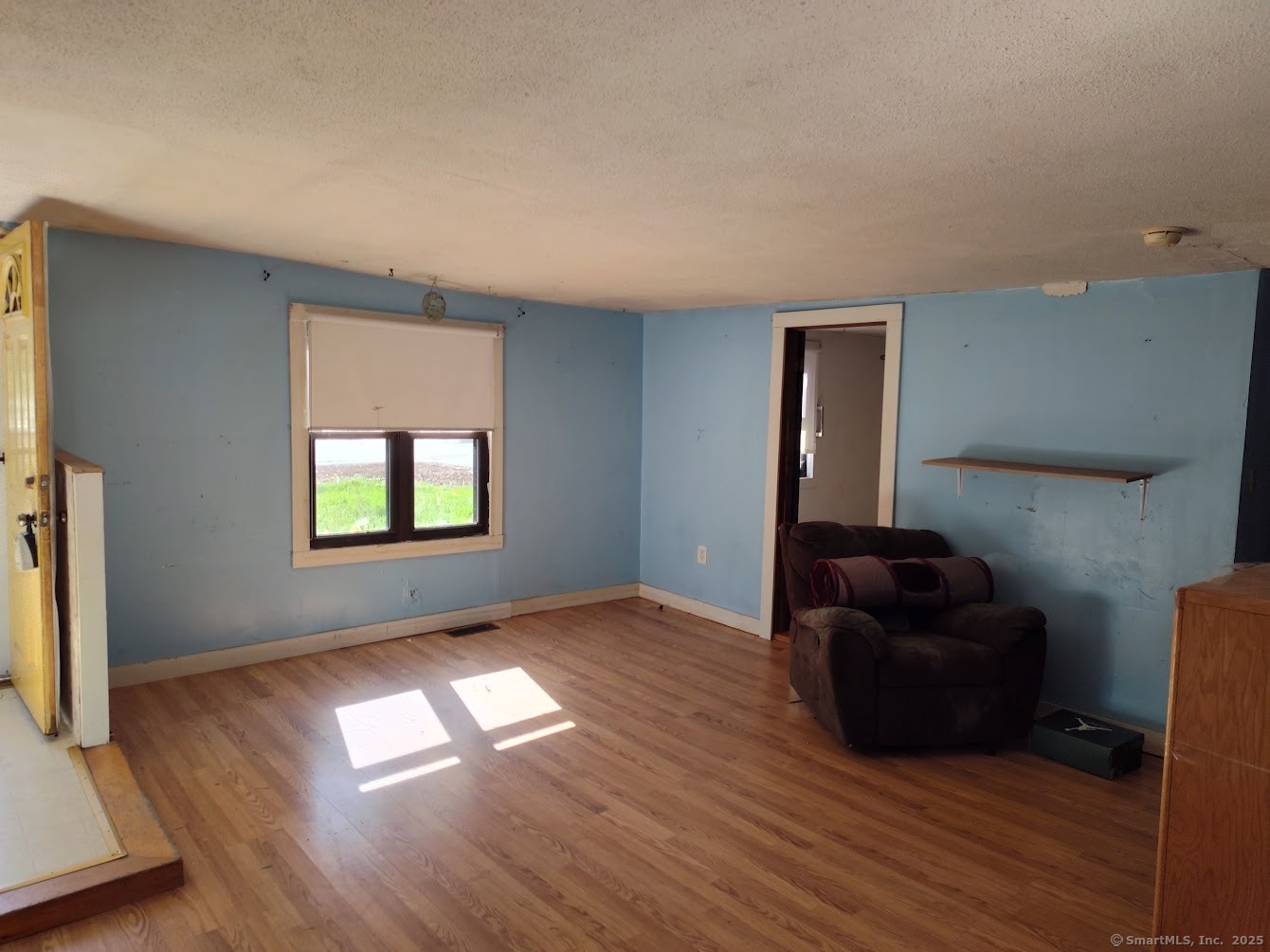 155 Iron Street Ledyard, CT 06339 - Photo 10 of 17 wooden floor in an empty room with a window