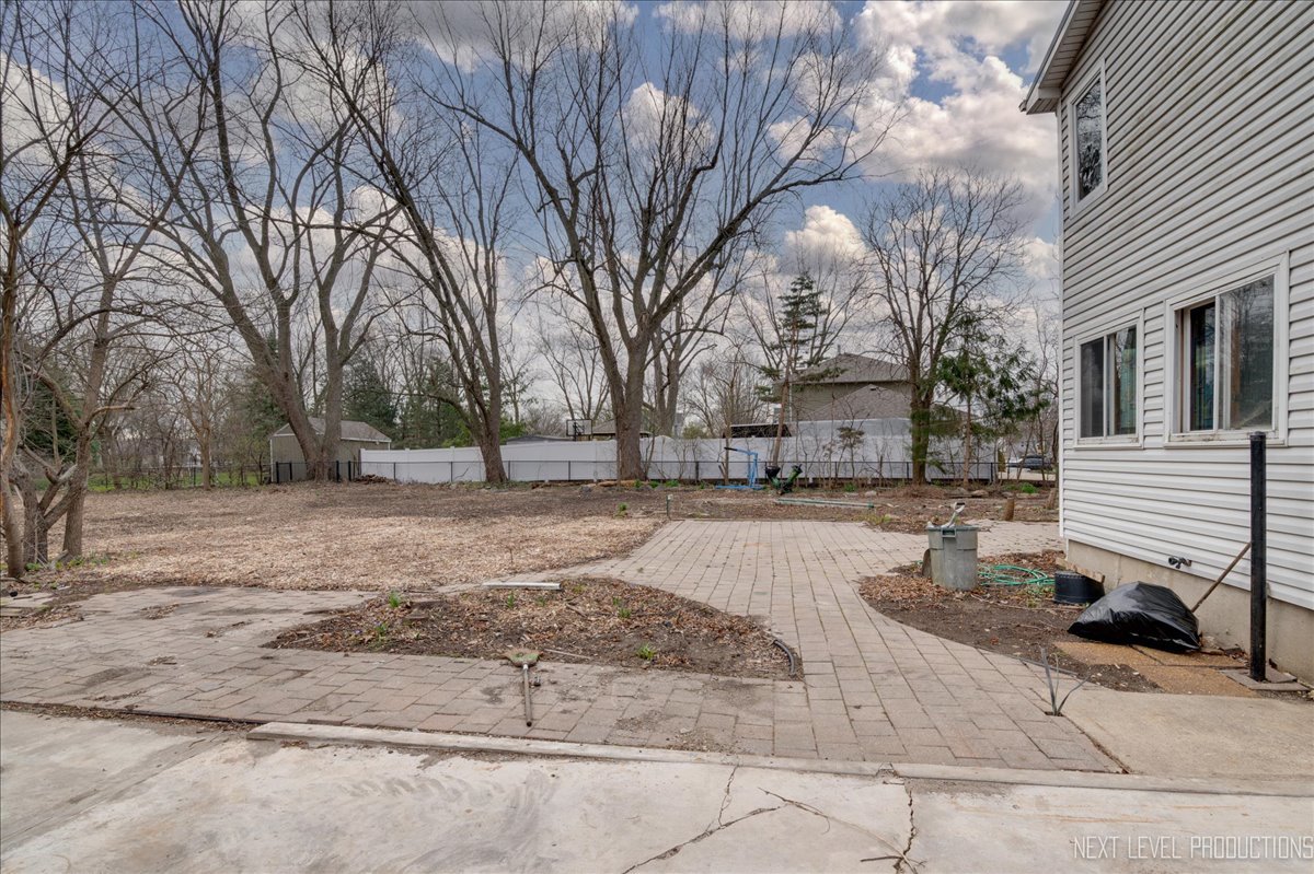 1703 Stoddard Avenue Wheaton, IL 60187 - Photo 5 of 9 a view of road with trees