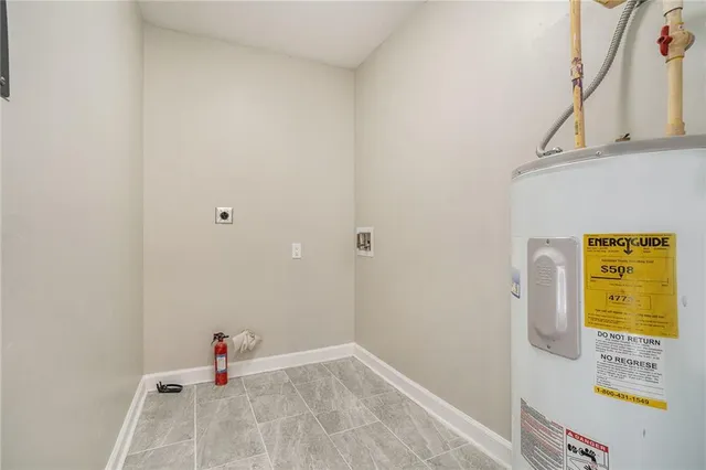 a view of a bathroom with a sink and a shower curtain