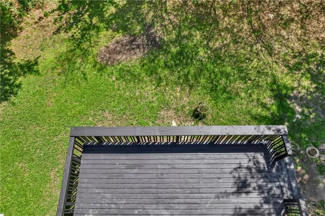 a view of a house with a wall