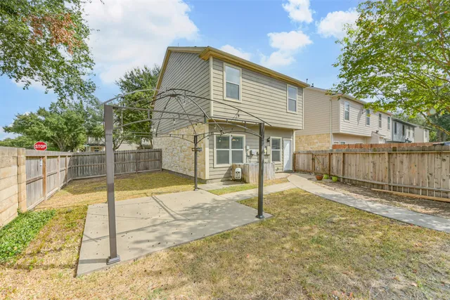 a backyard of a house with a small yard