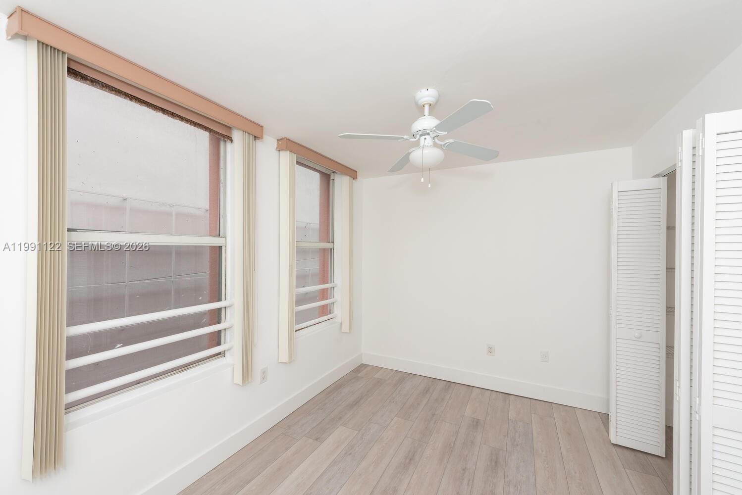 2801 Florida Avenue, Unit 441 Miami, FL 33133 - Photo 12 of 24 a view of an empty room with a window
