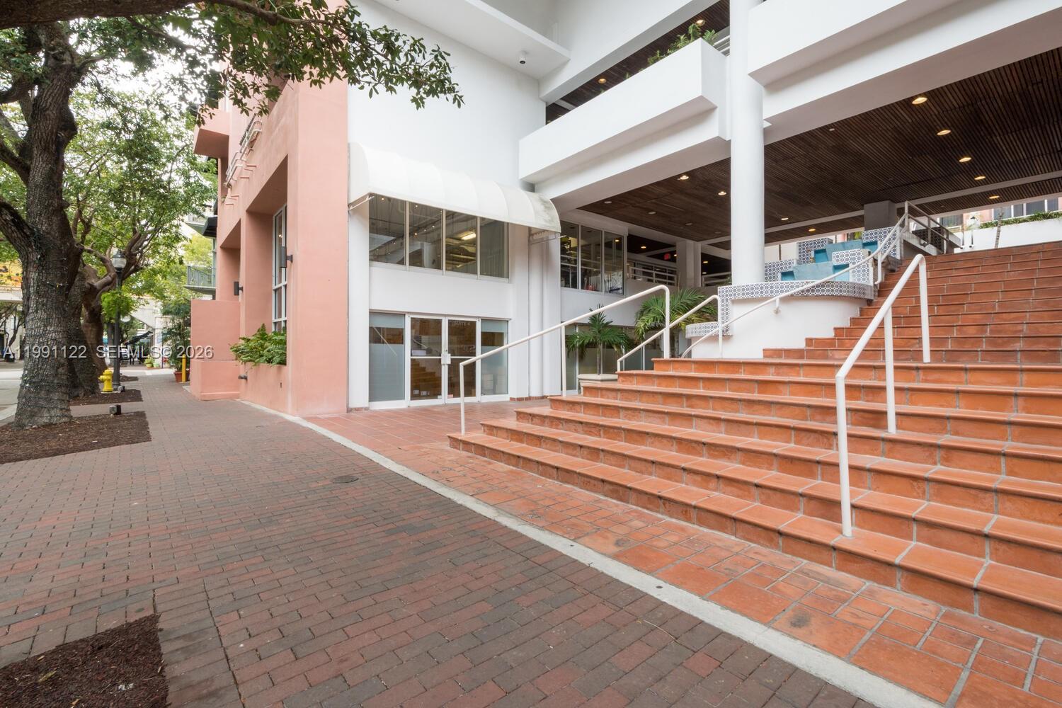 2801 Florida Avenue, Unit 441 Miami, FL 33133 - Photo 2 of 24 a view of a building with a street