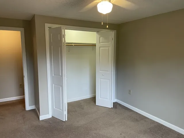 an empty room with a empty space and a window