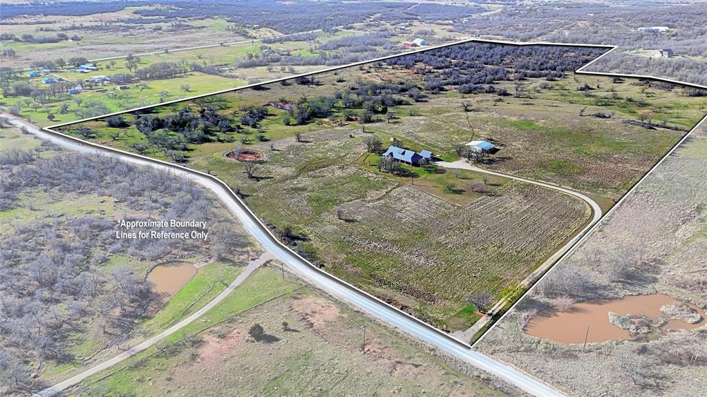 4460 Hildreth Pool Road Bowie, TX 76230 - Photo 4 of 40 a view of a yard with wooden floor
