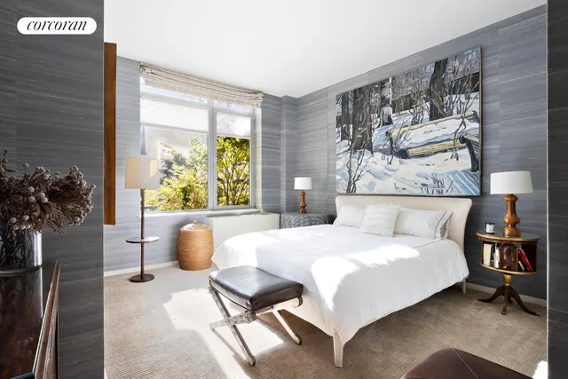 a work room with furniture and a chandelier