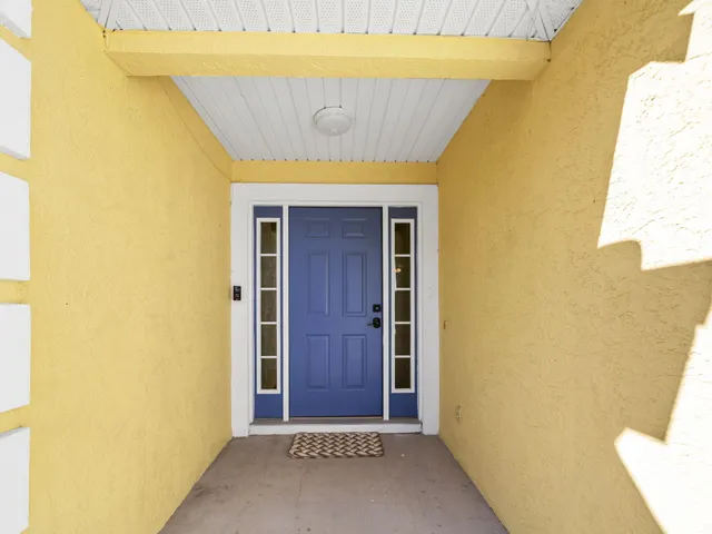 a workspace with furniture and a window