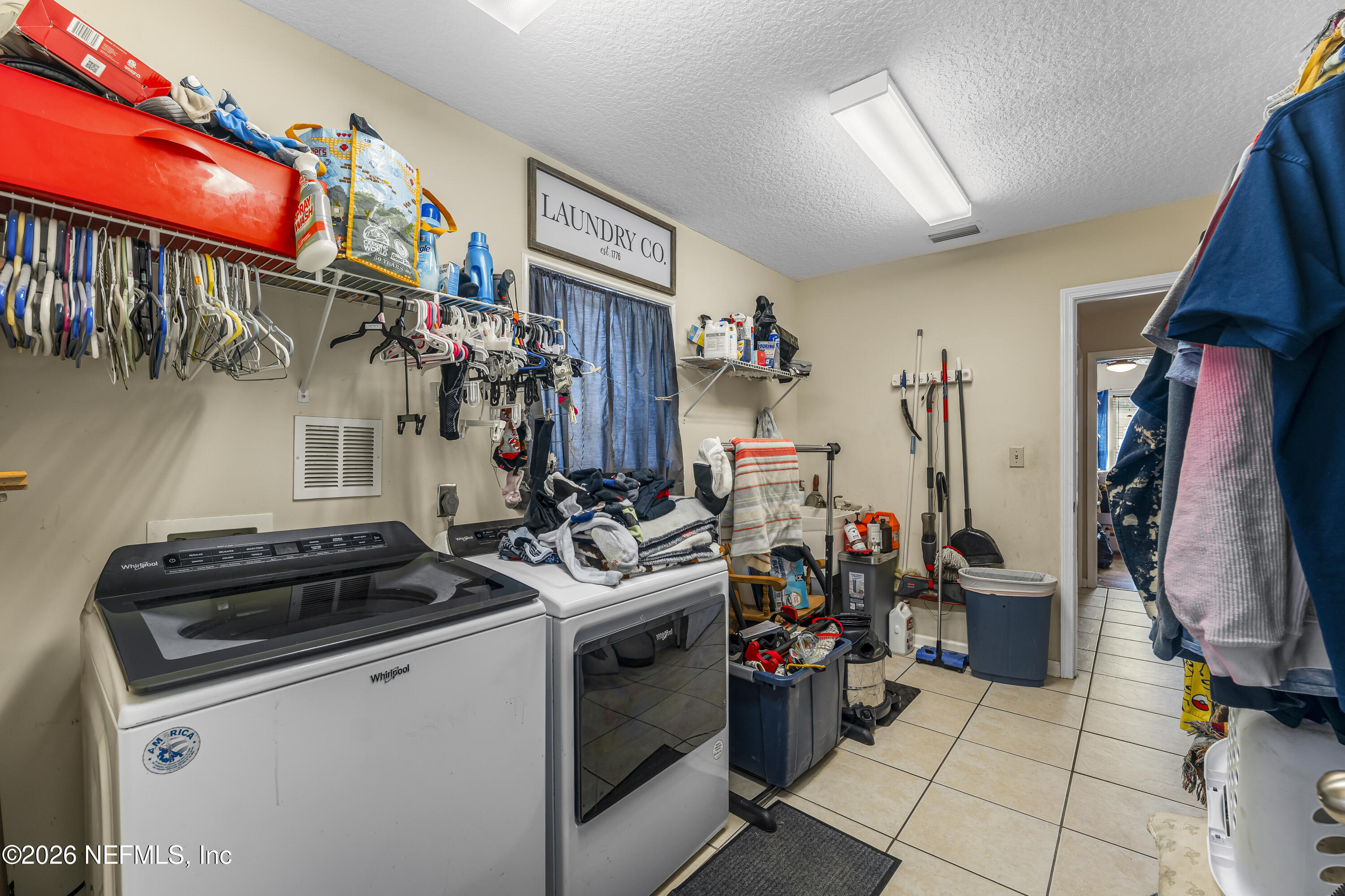 1725 Davidson Farm Road Jacksonville, FL 32218 - Photo 43 of 53 a view of a storage and utility room