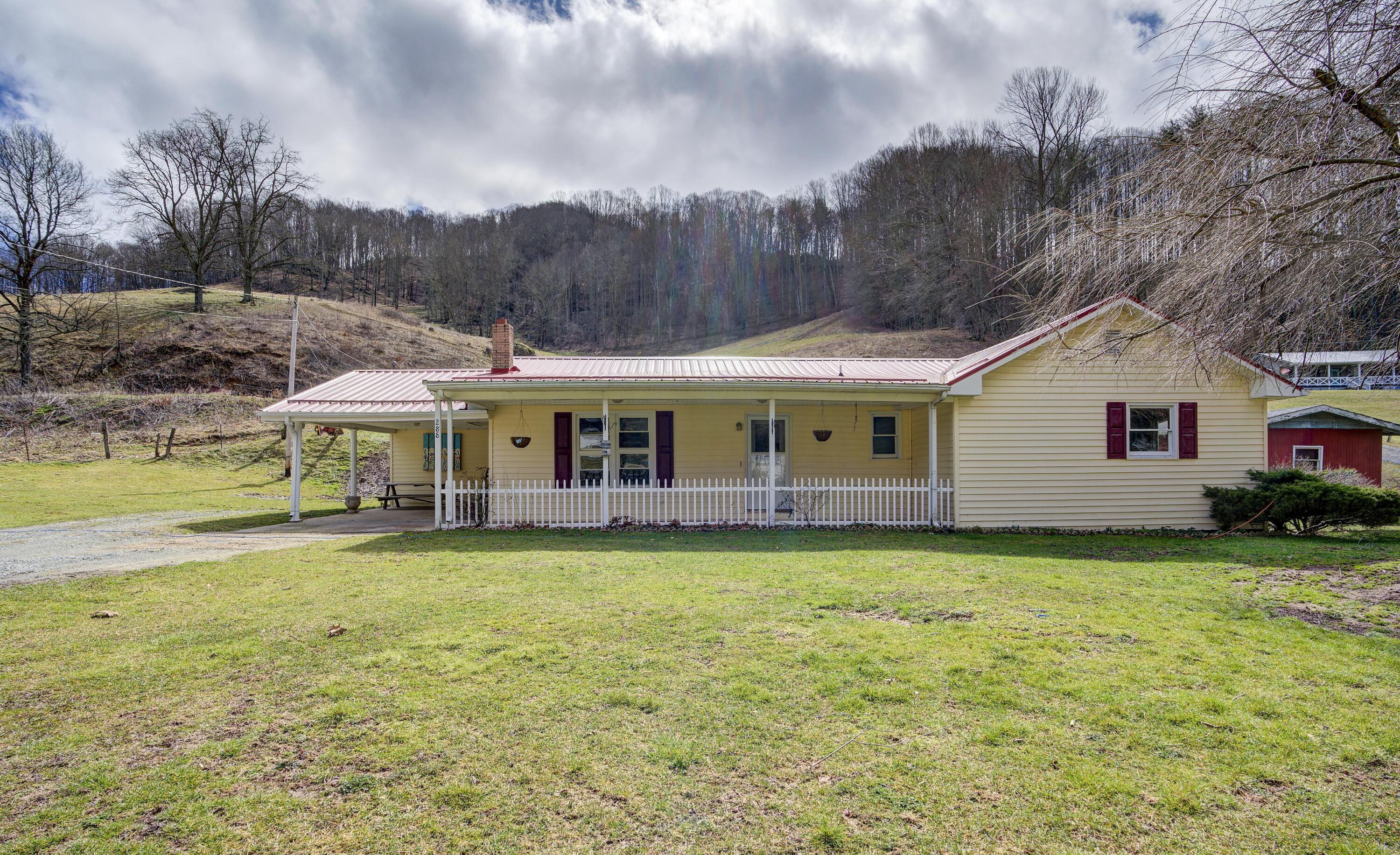 288 Shell Creek Road Roan Mountain, TN 37687 - Photo 1 of 31 288 Shell Creek Road