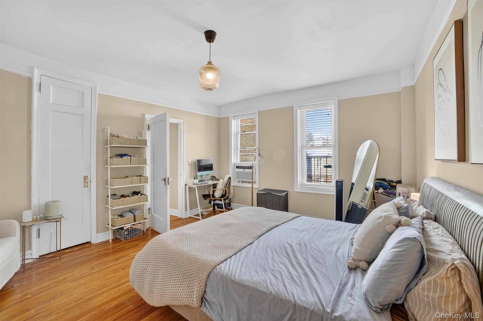 219 Bronx River Road, Unit 4N Yonkers, NY 10704 - Photo 24 of 30 a bedroom with a bed and a view of bedroom