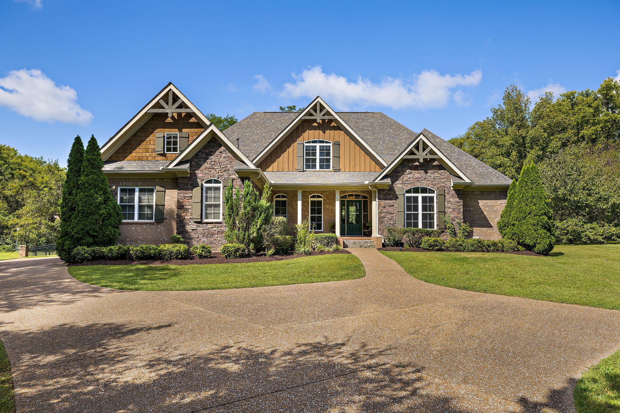 1420 Hunter Road Franklin, TN 37064 - Photo 2 of 57 a front view of a house with a yard