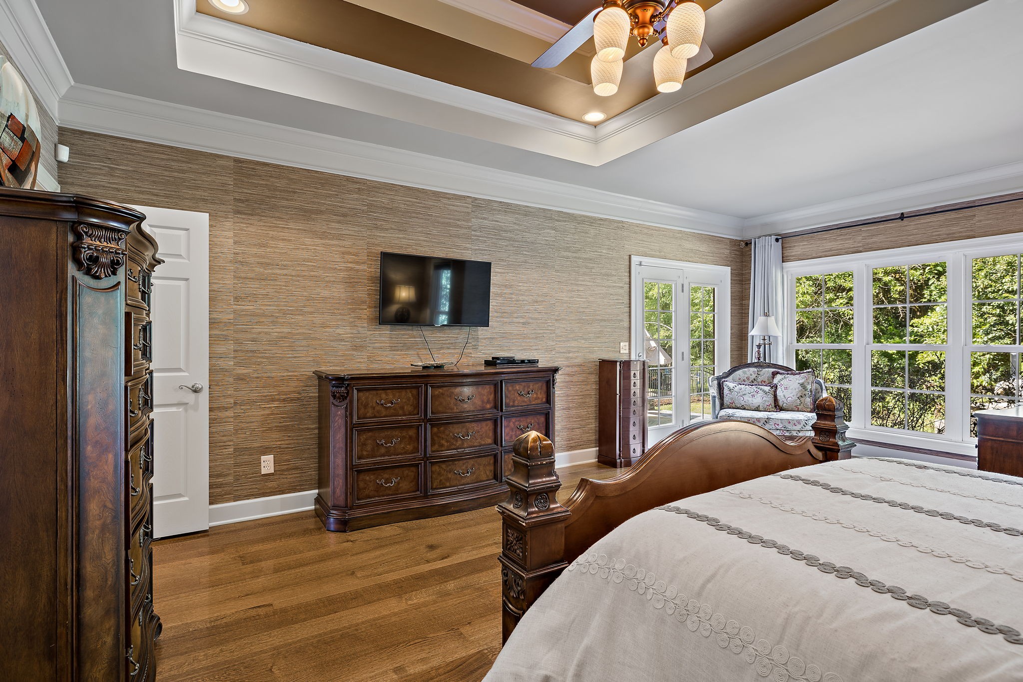 1420 Hunter Road Franklin, TN 37064 - Photo 25 of 57 a bedroom with a bed and a flat tv screen on dresser