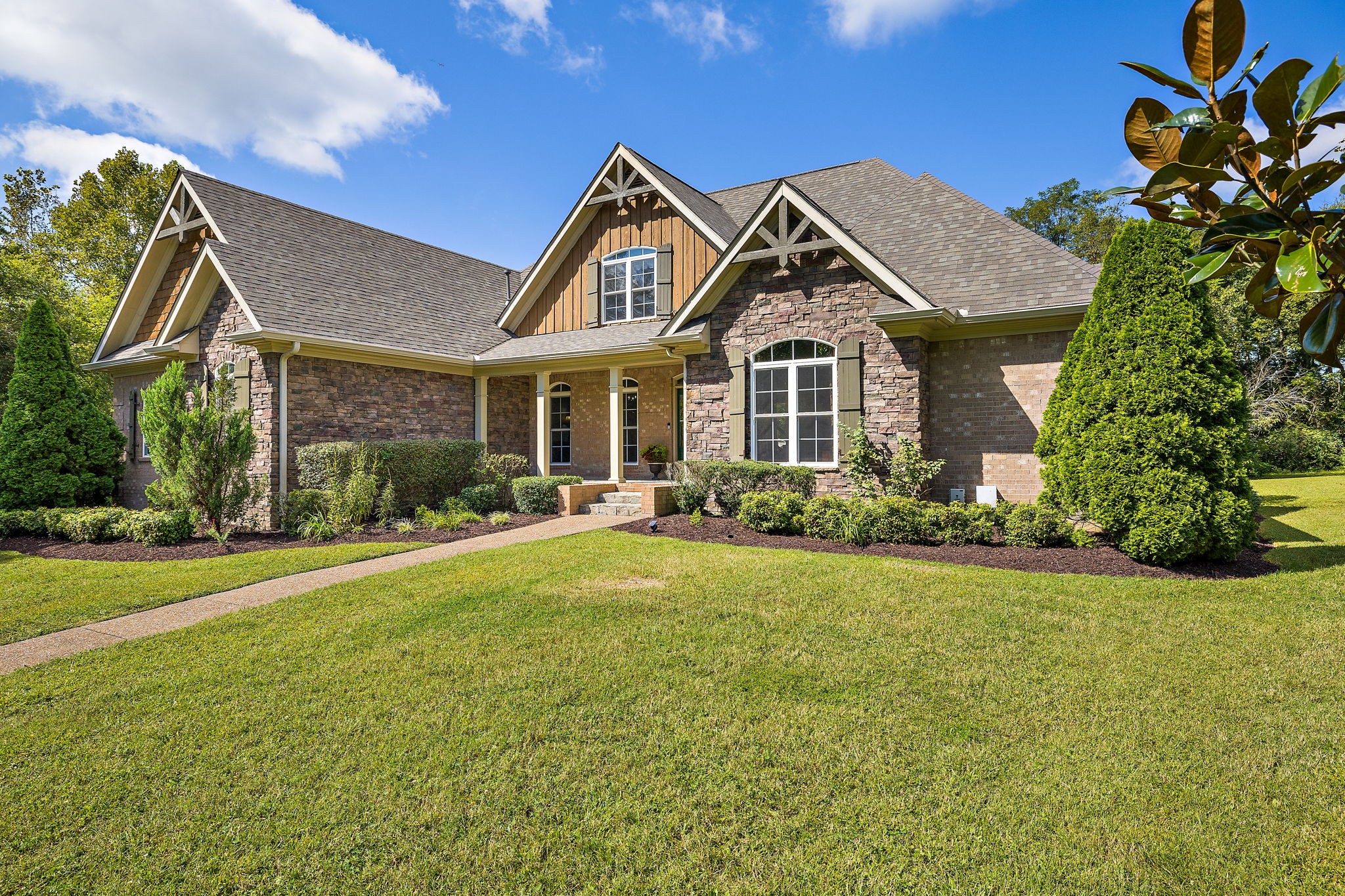 1420 Hunter Road Franklin, TN 37064 - Photo 3 of 57 a front view of a house with a yard